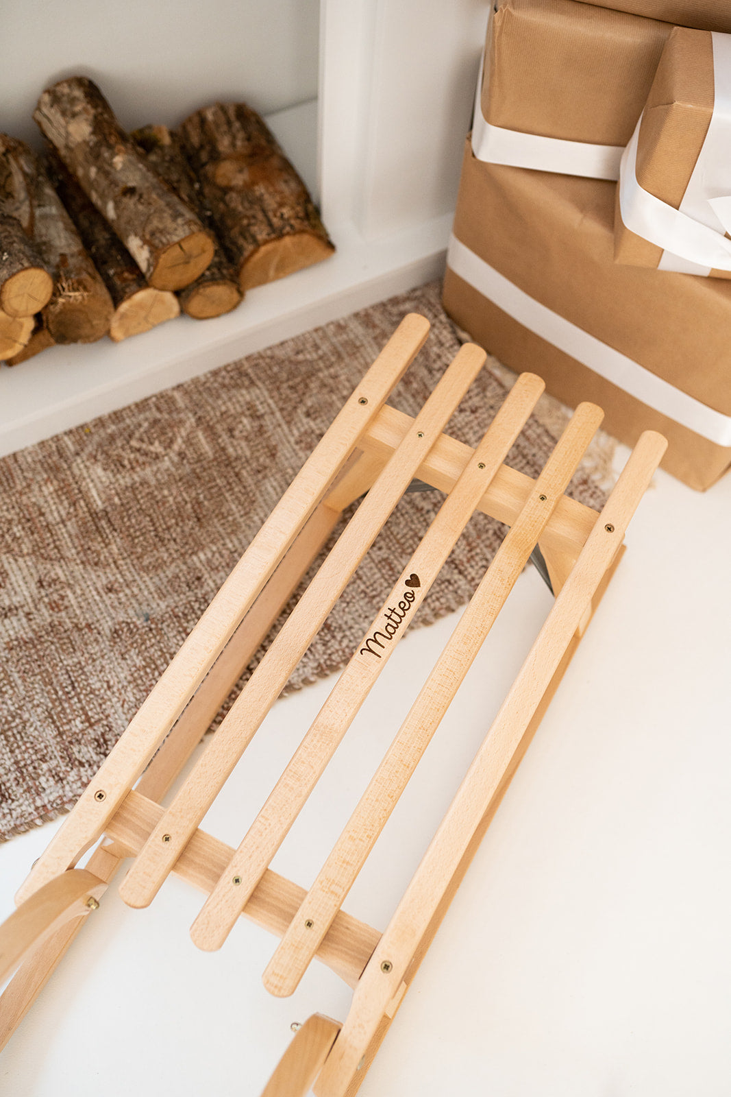 Hörnerschlitten Holz mit Lattensitz - personalisiert