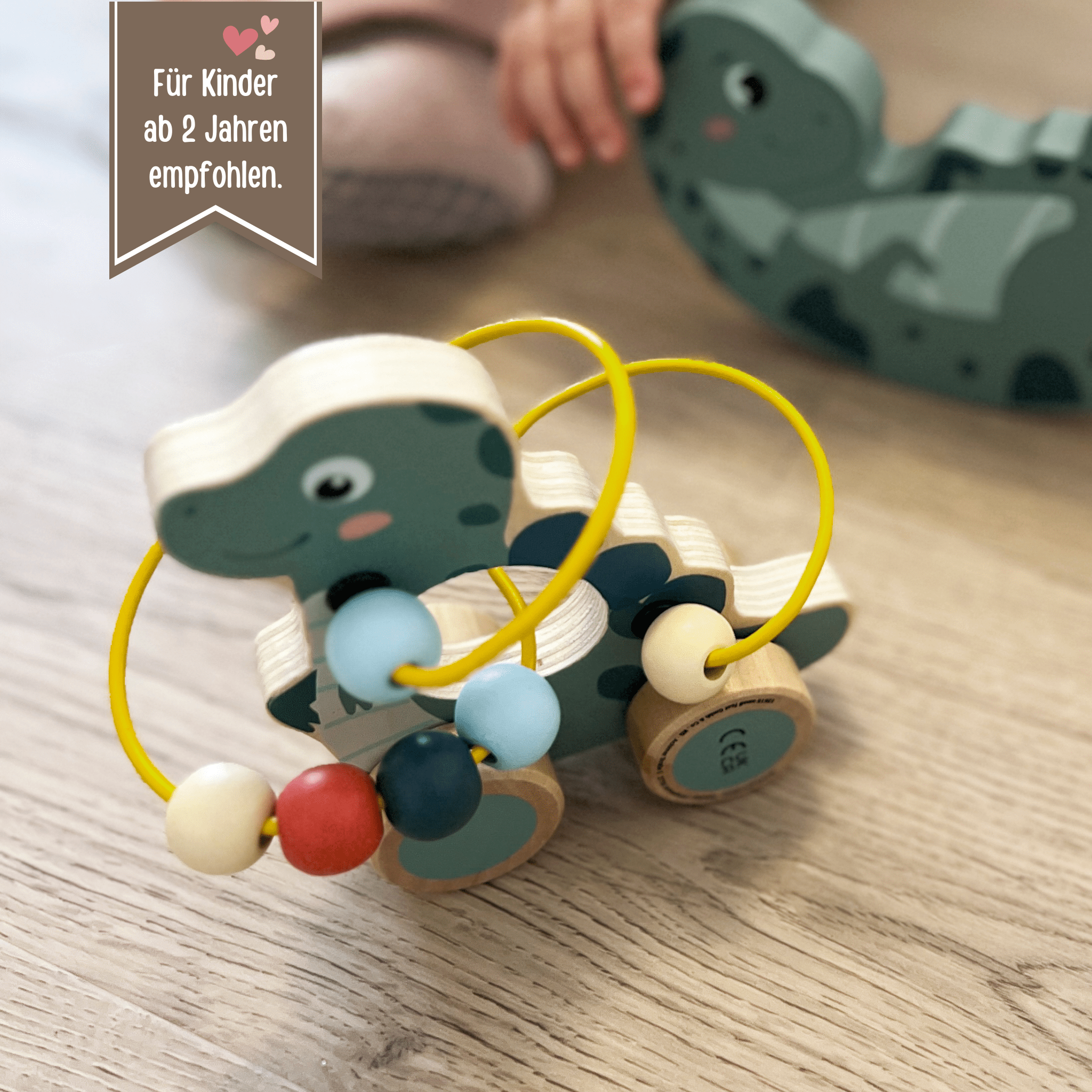 SMALL FOOT Motorikschleife "Dino grün" personalisiert - wunderwunsch